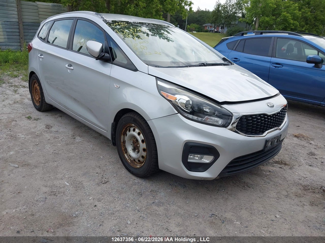 KNAHT8A3XH7180606 · 2017 KIA RONDO