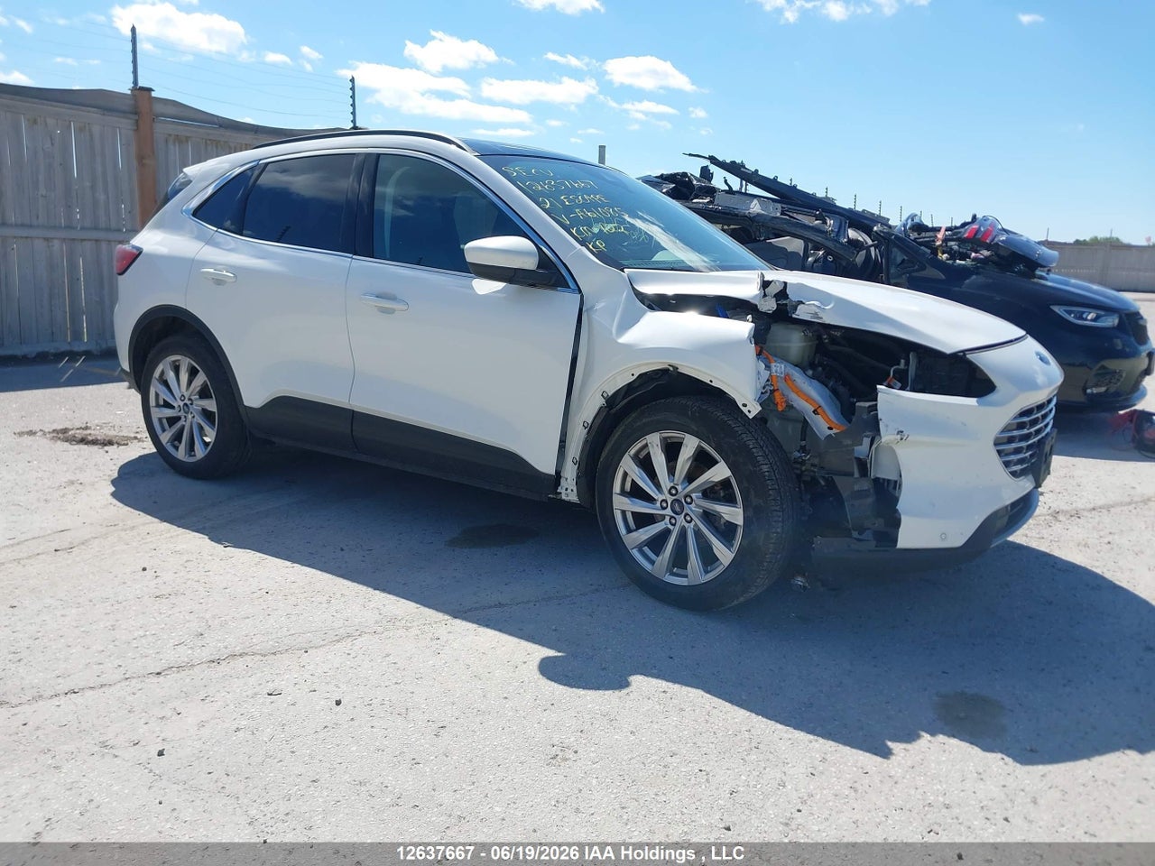 1FMCU9DZ6MUA61085 · 2021 FORD ESCAPE TITANIUM HYBRID
