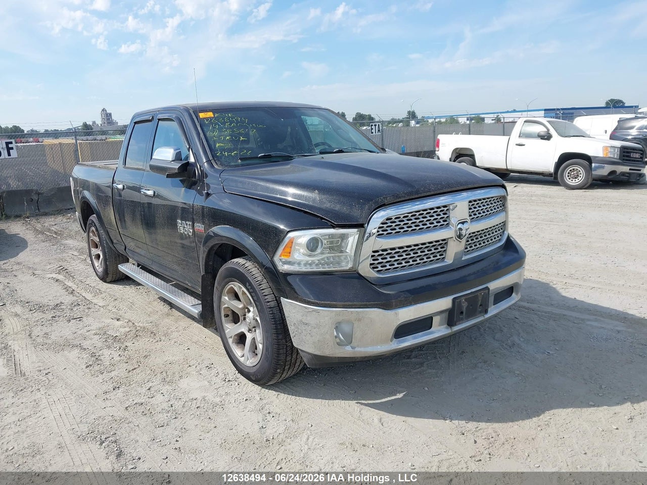 1C6RR7JT0ES385612 · 2014 RAM 1500 LARAMIE