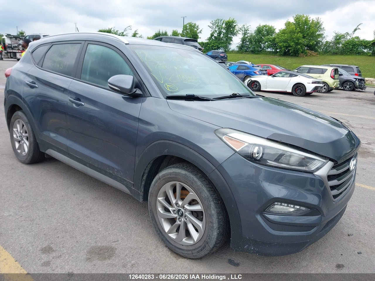 KM8J3CA42HU298811 · 2017 HYUNDAI TUCSON PREMIUM