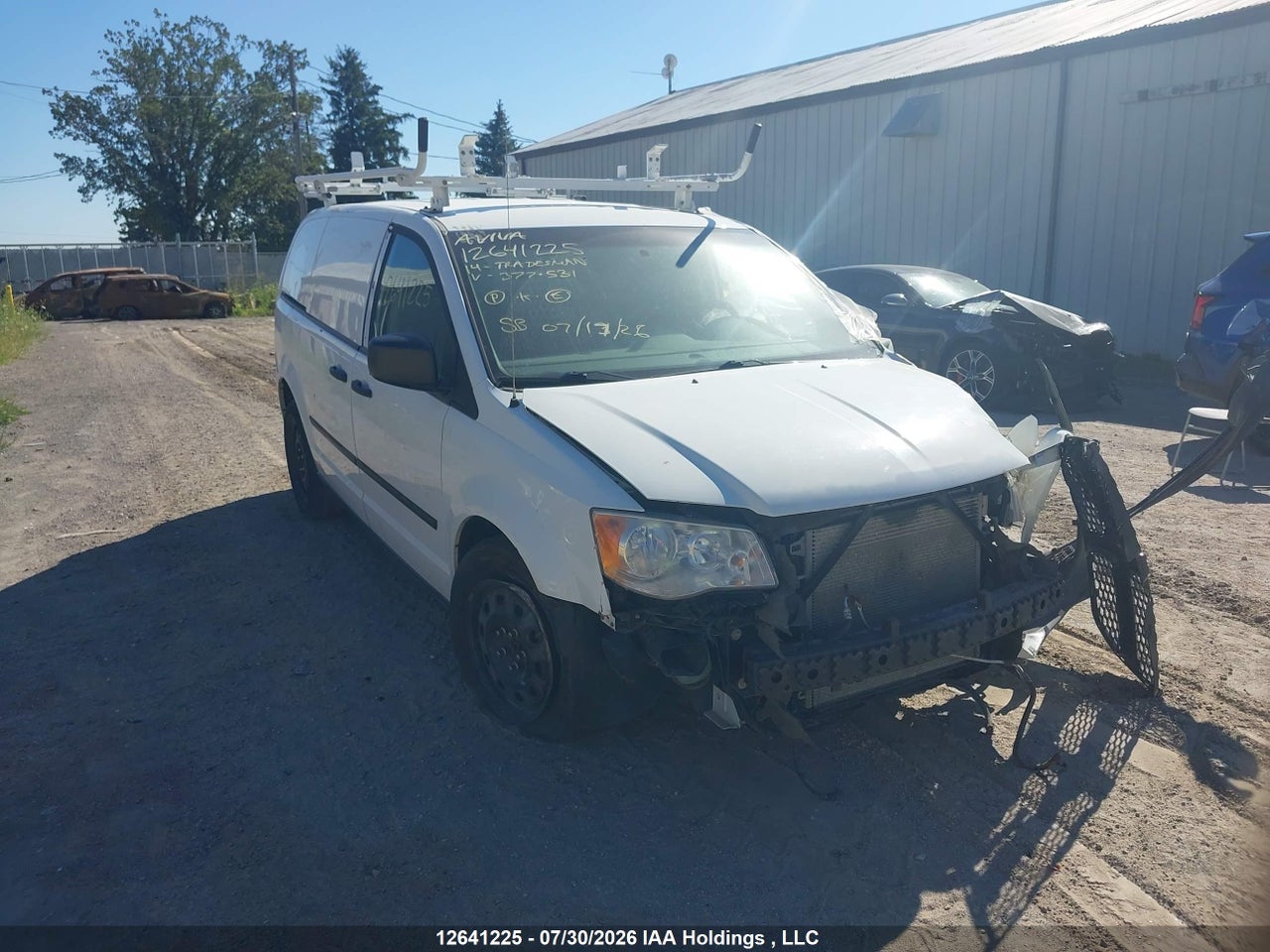 2C4JRGAG1ER377531 · 2014 RAM TRADESMAN
