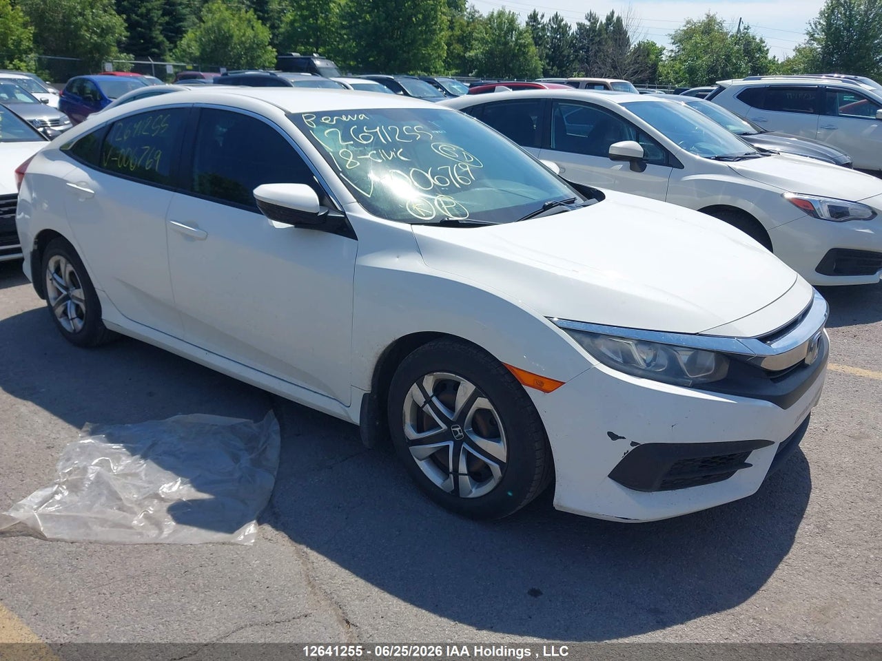 2HGFC2F56JH006769 · 2018 HONDA CIVIC LX