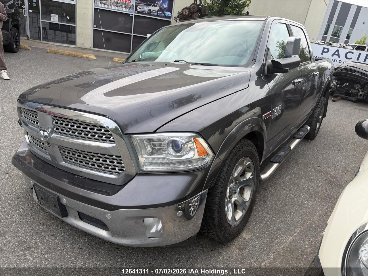1C6RR7VM0FS679581 · 2015 RAM 1500 LARAMIE