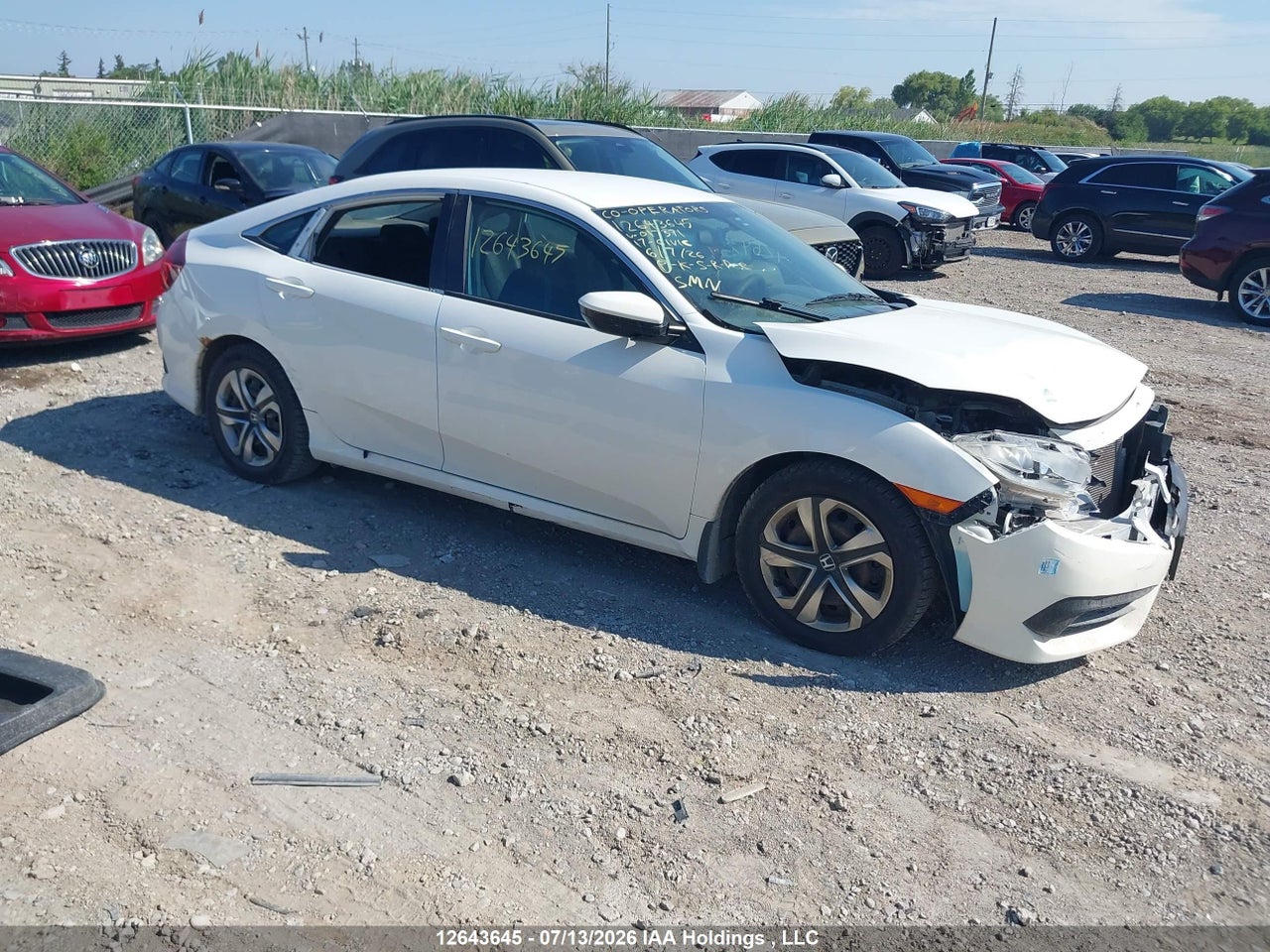 2HGFC2E55HH017371 · 2017 HONDA CIVIC LX