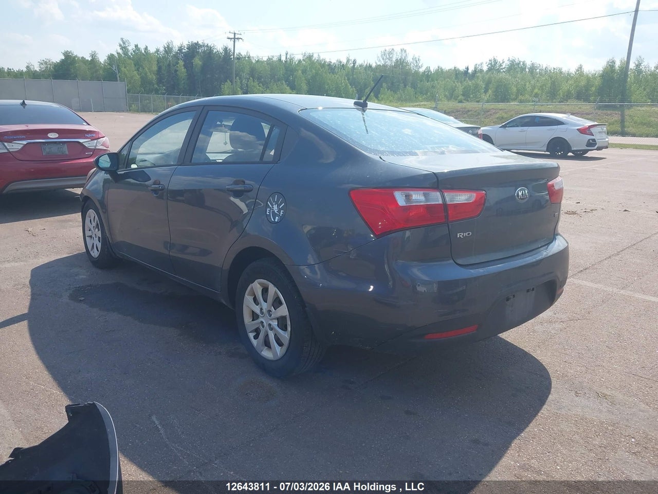 KNADM4A32E6346204 · 2014 KIA RIO LX · 3/22