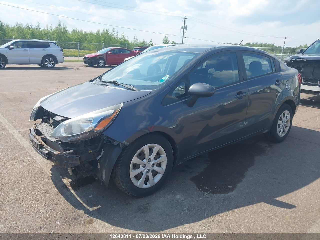KNADM4A32E6346204 · 2014 KIA RIO LX · 2/22