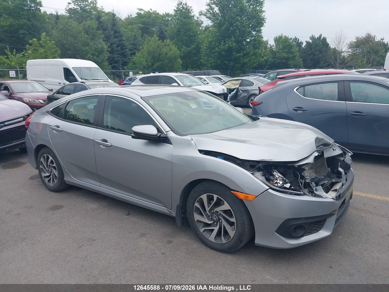 2HGFC2F81JH039852 · 2018 HONDA CIVIC EX