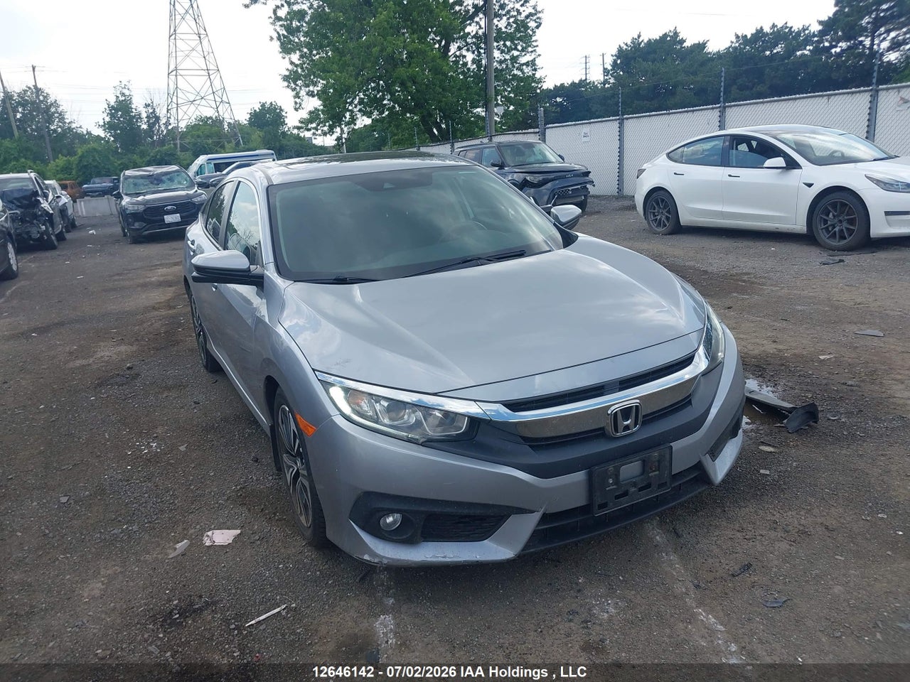 2HGFC1F45HH109001 · 2017 HONDA CIVIC EX