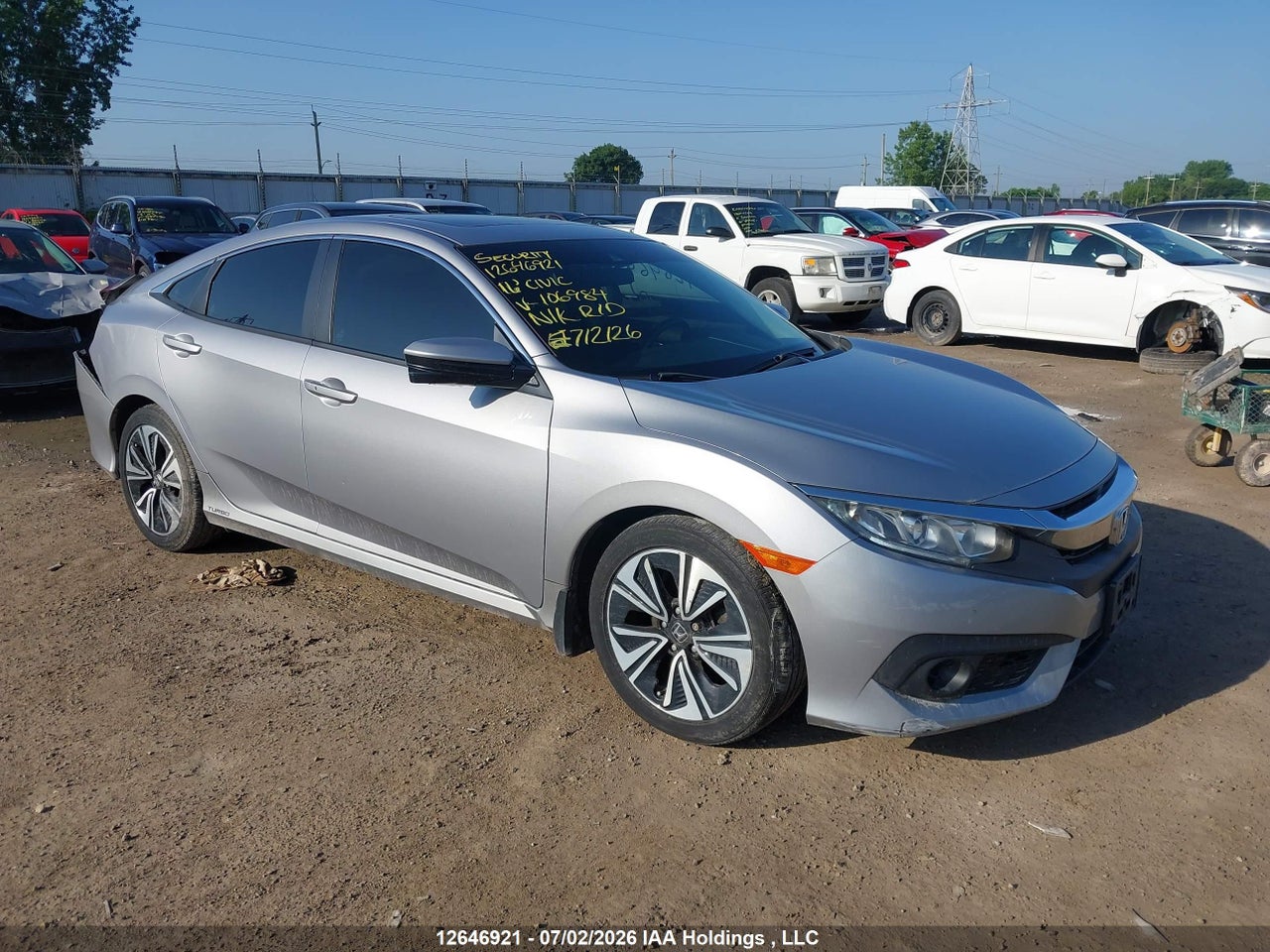 2HGFC1F43GH106984 · 2016 HONDA CIVIC EX-T