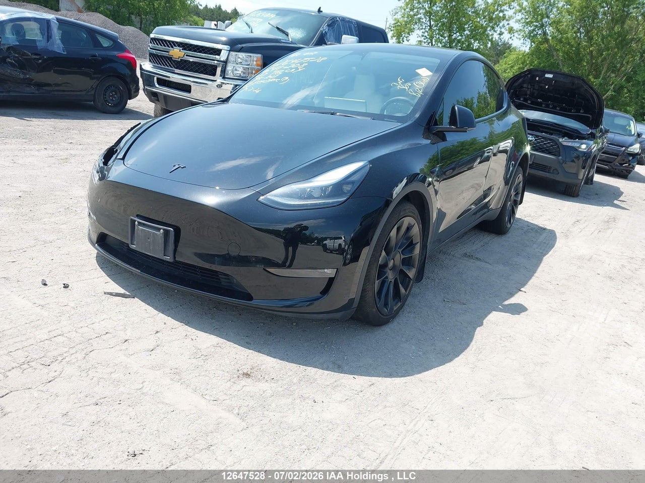 7SAYGDEE4PF641208 · 2023 TESLA MODEL Y LONG RANGE · 2/18