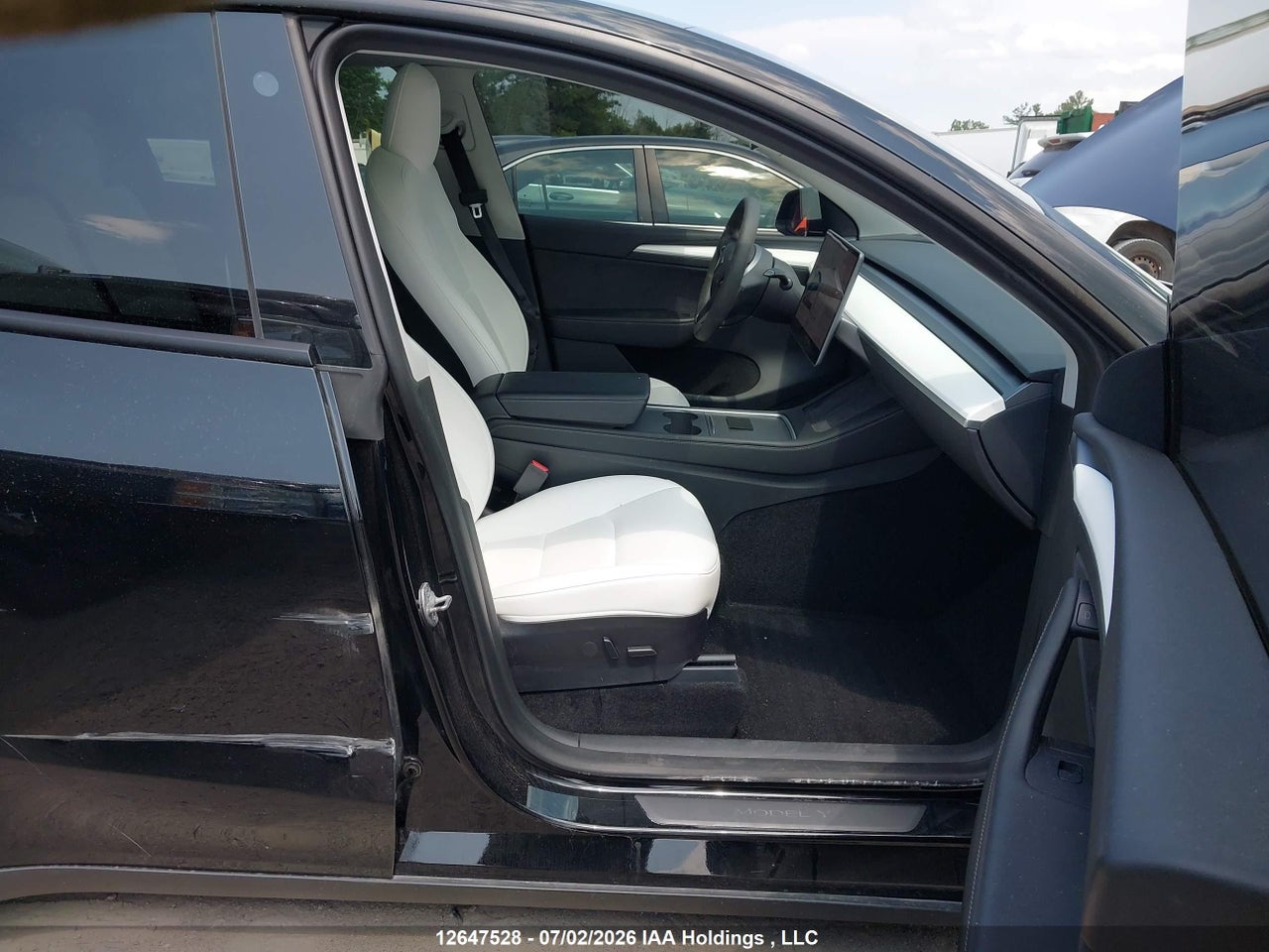 7SAYGDEE4PF641208 · 2023 TESLA MODEL Y LONG RANGE · 5/18