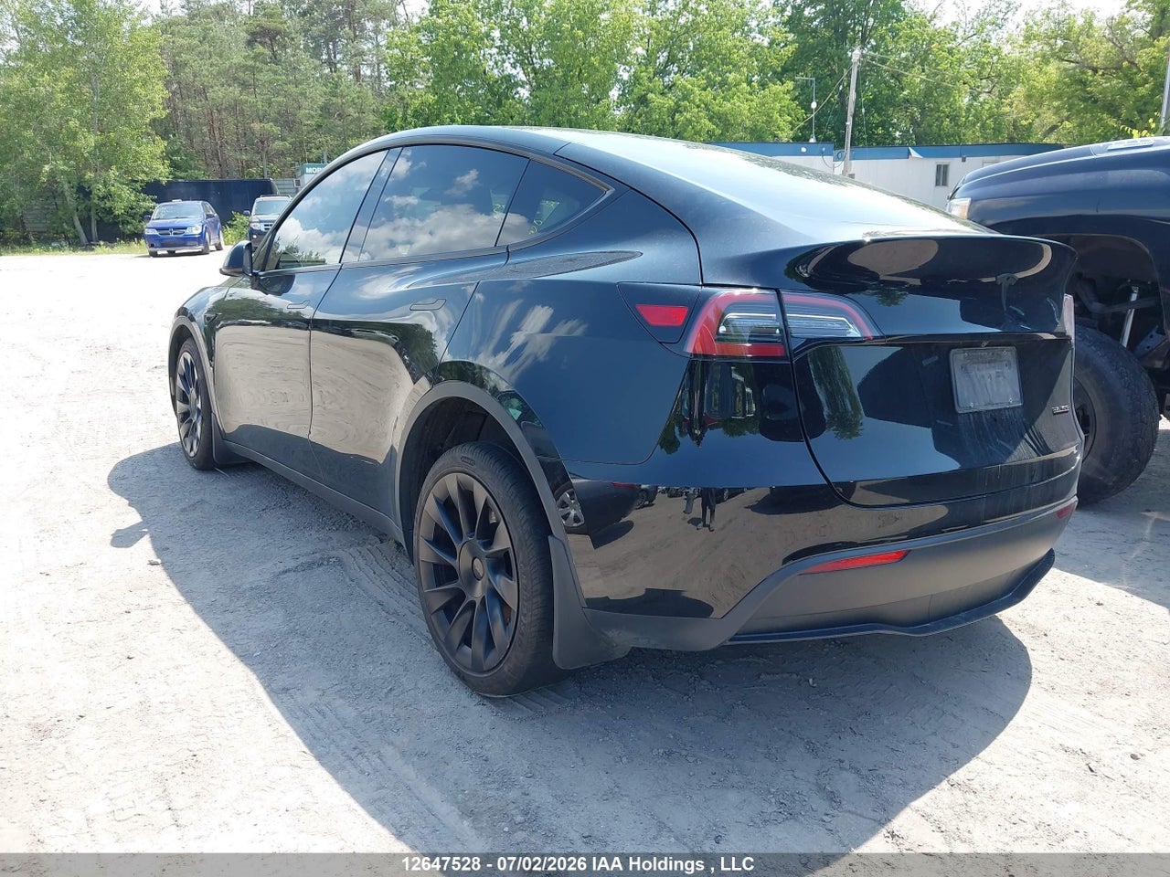 7SAYGDEE4PF641208 · 2023 TESLA MODEL Y LONG RANGE · 3/18