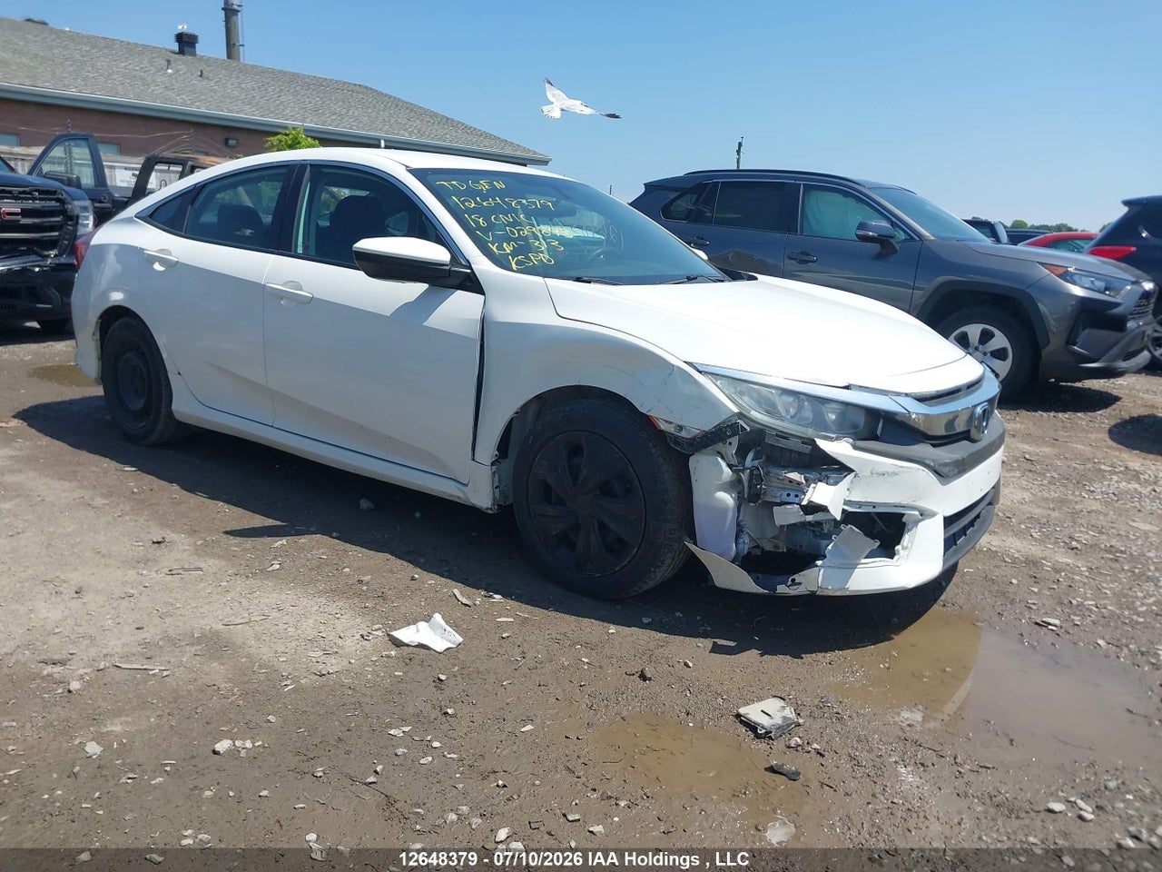 2HGFC2F58JH029843 · 2018 HONDA CIVIC LX