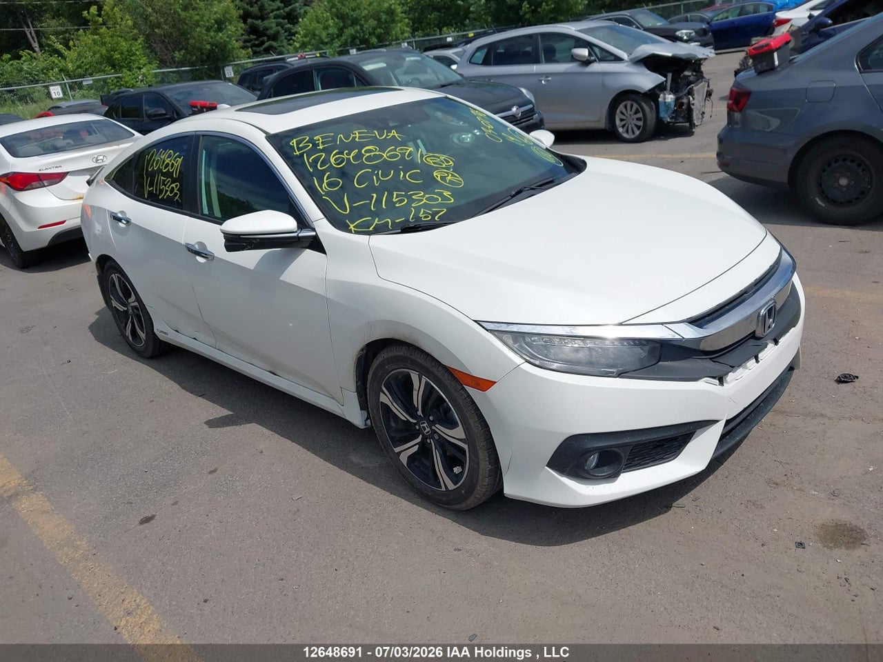 2HGFC1F94GH115303 · 2016 HONDA Civic touring