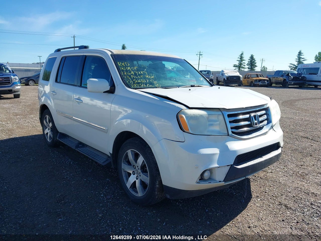 5FNYF4H99DB506557 · 2013 HONDA PILOT TOURING
