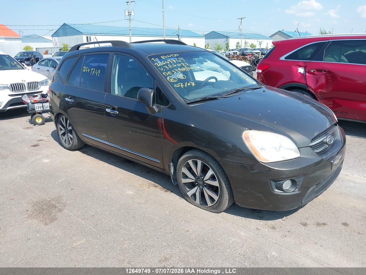 KNAHH8C61A7326082 · 2010 KIA RONDO EX