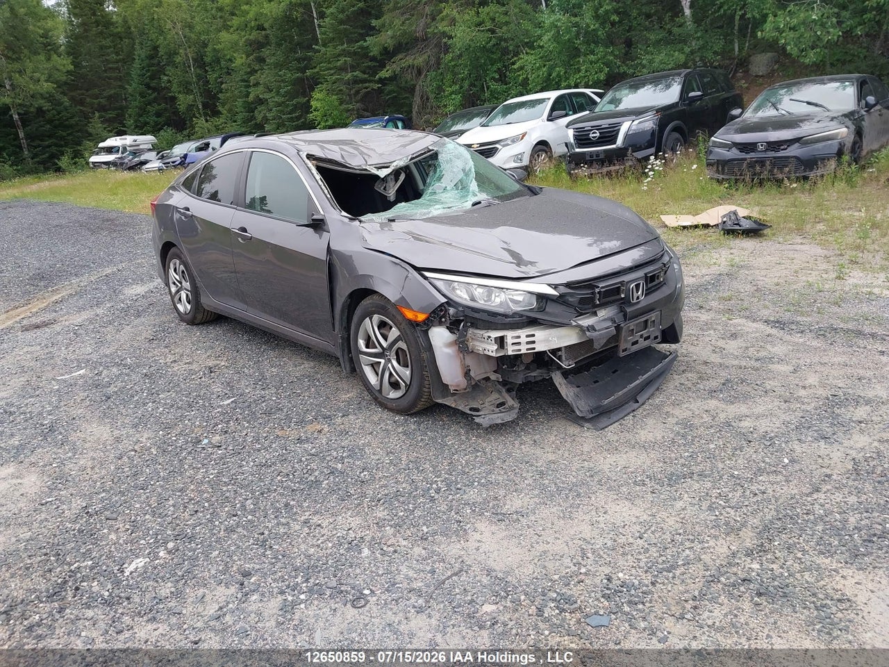 2HGFC2F57JH001516 · 2018 HONDA CIVIC LX