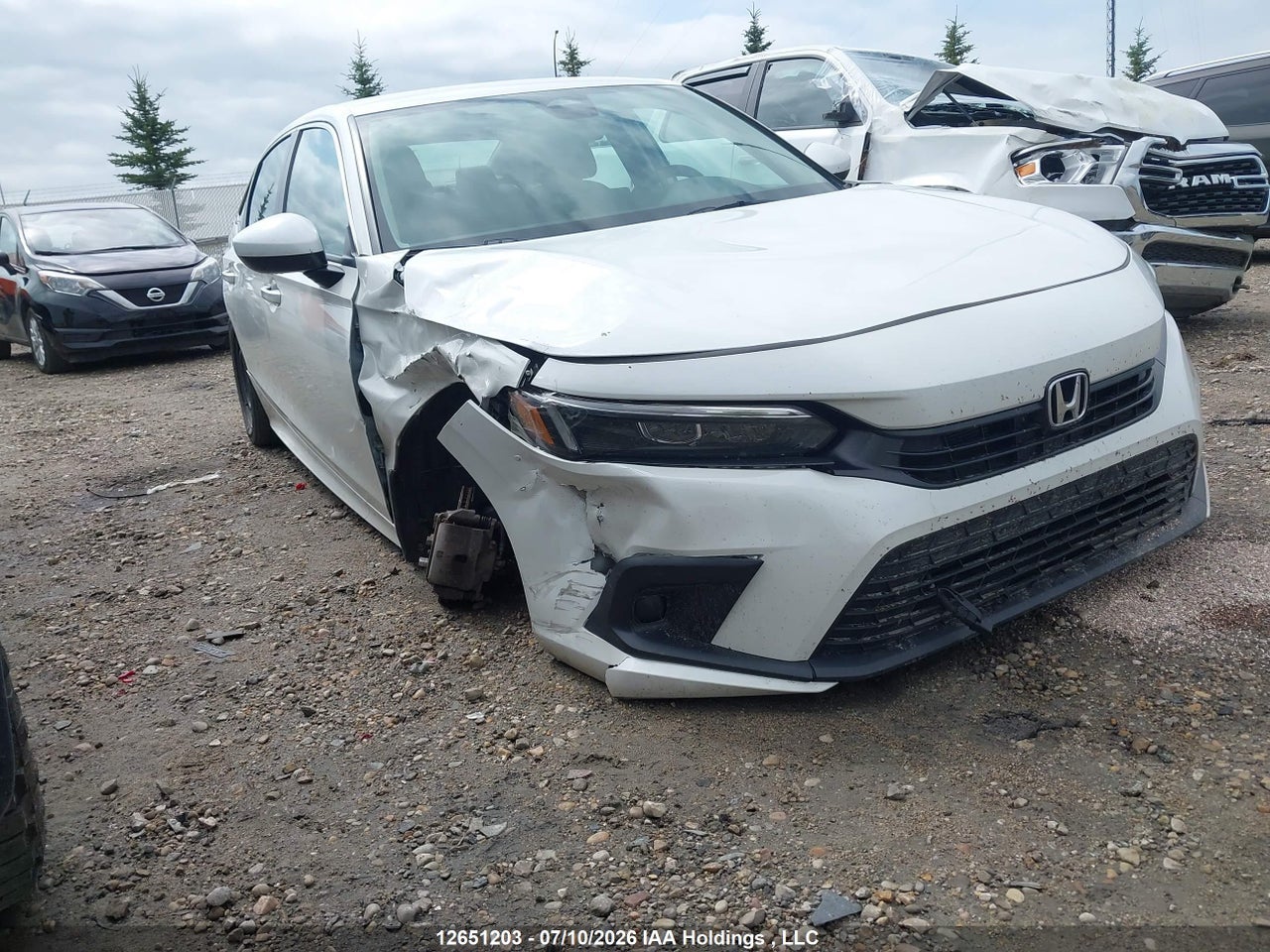 2HGFE2F23PH107518 · 2023 HONDA CIVIC LX