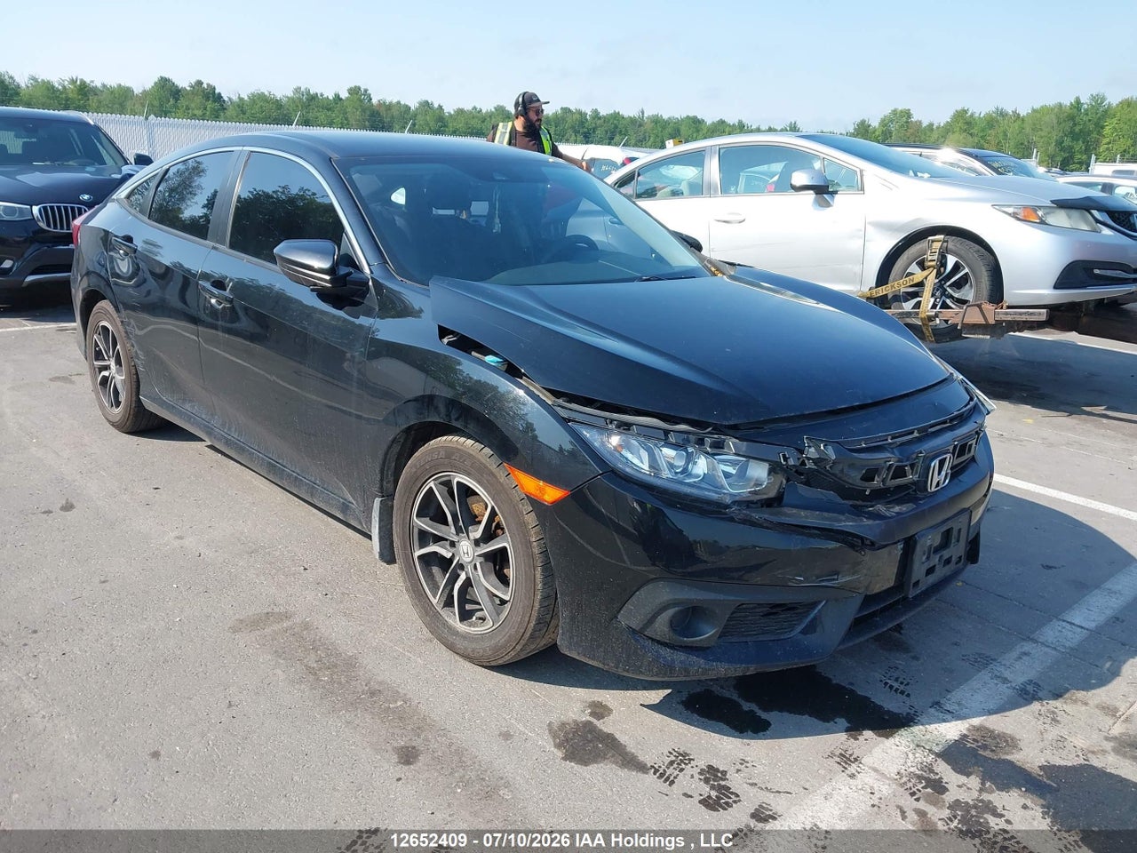 2HGFC2F64HH011455 · 2017 HONDA CIVIC LX