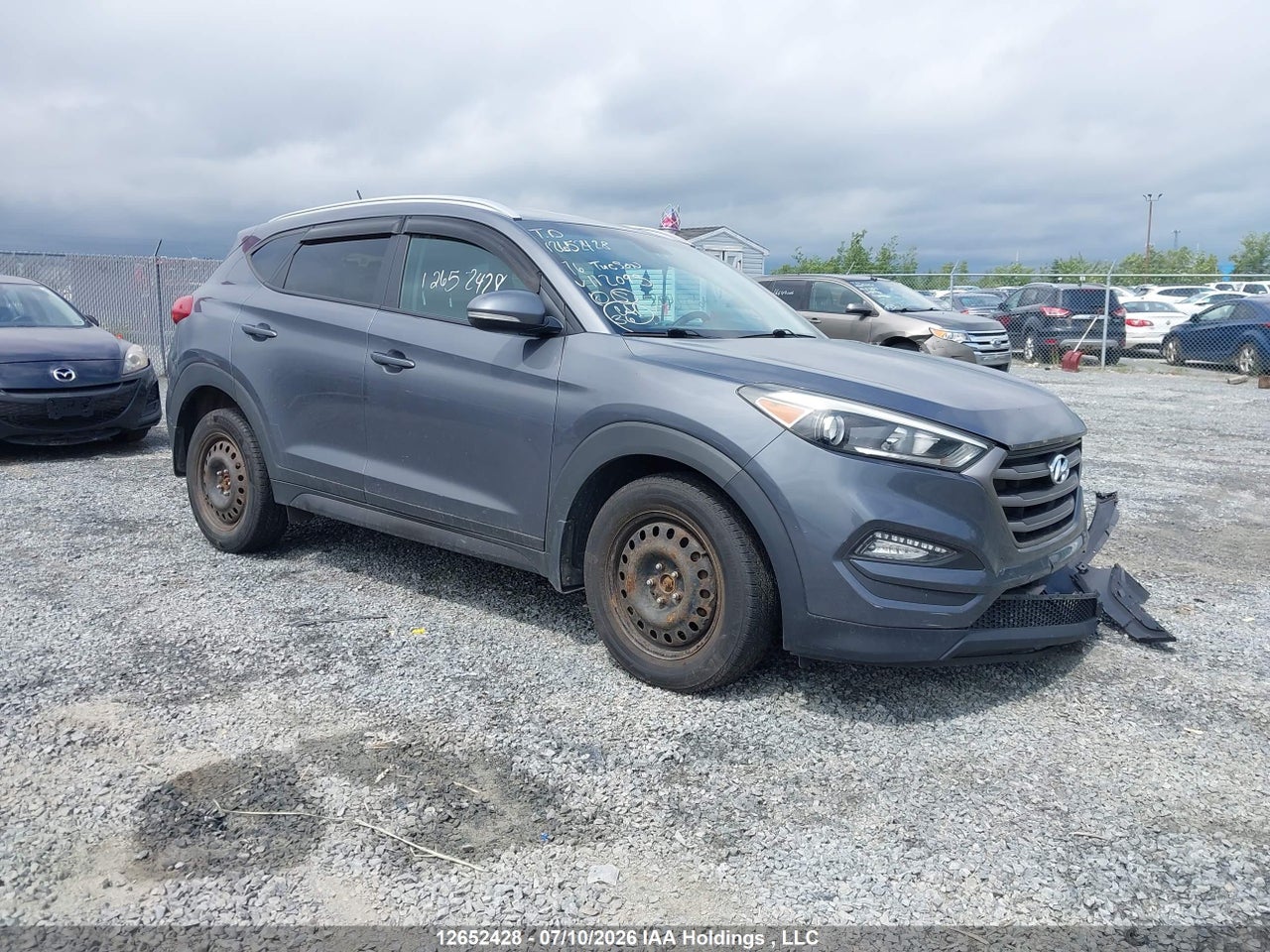 KM8J3CA47GU112095 · 2016 HYUNDAI TUCSON PREMIUM
