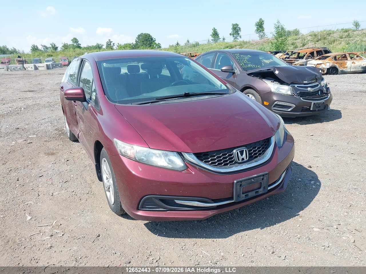 2HGFB2F40FH031085 · 2015 HONDA CIVIC LX