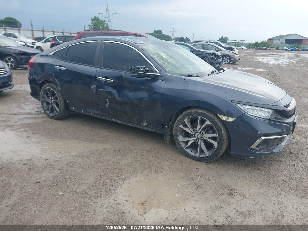 2HGFC1F95KH104156 · 2019 HONDA Civic touring