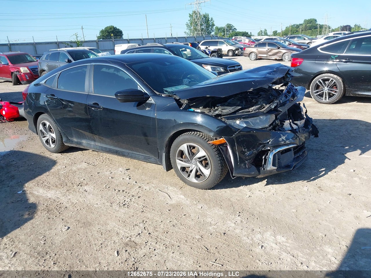 2HGFC2E59LH013171 · 2020 HONDA CIVIC LX