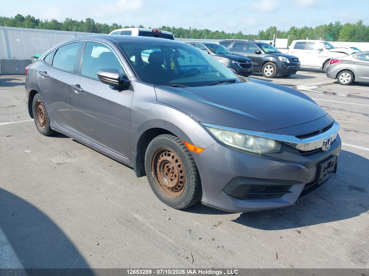 2HGFC2F52GH013095 · 2016 HONDA CIVIC LX