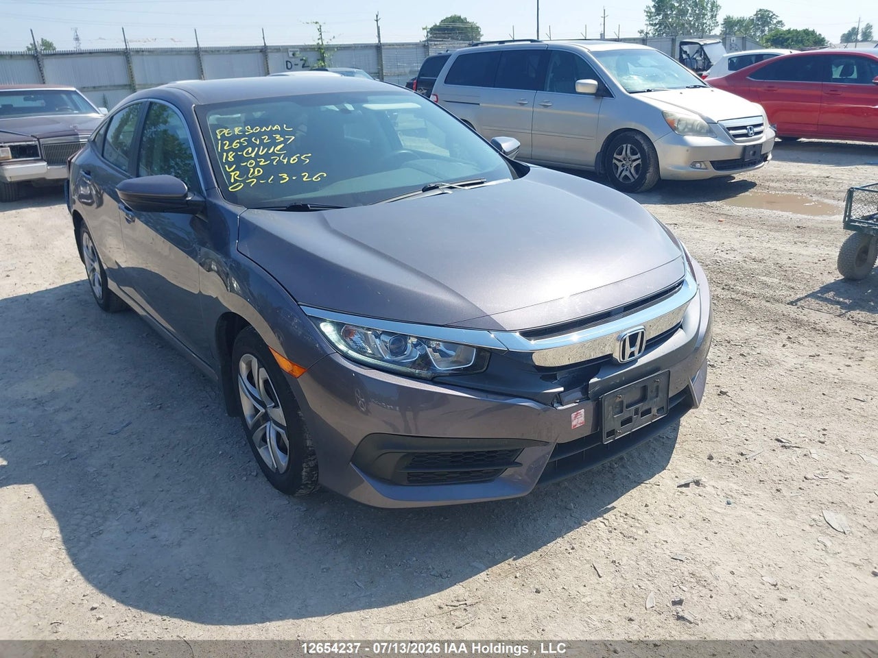 2HGFC2E51JH027465 · 2018 HONDA CIVIC LX