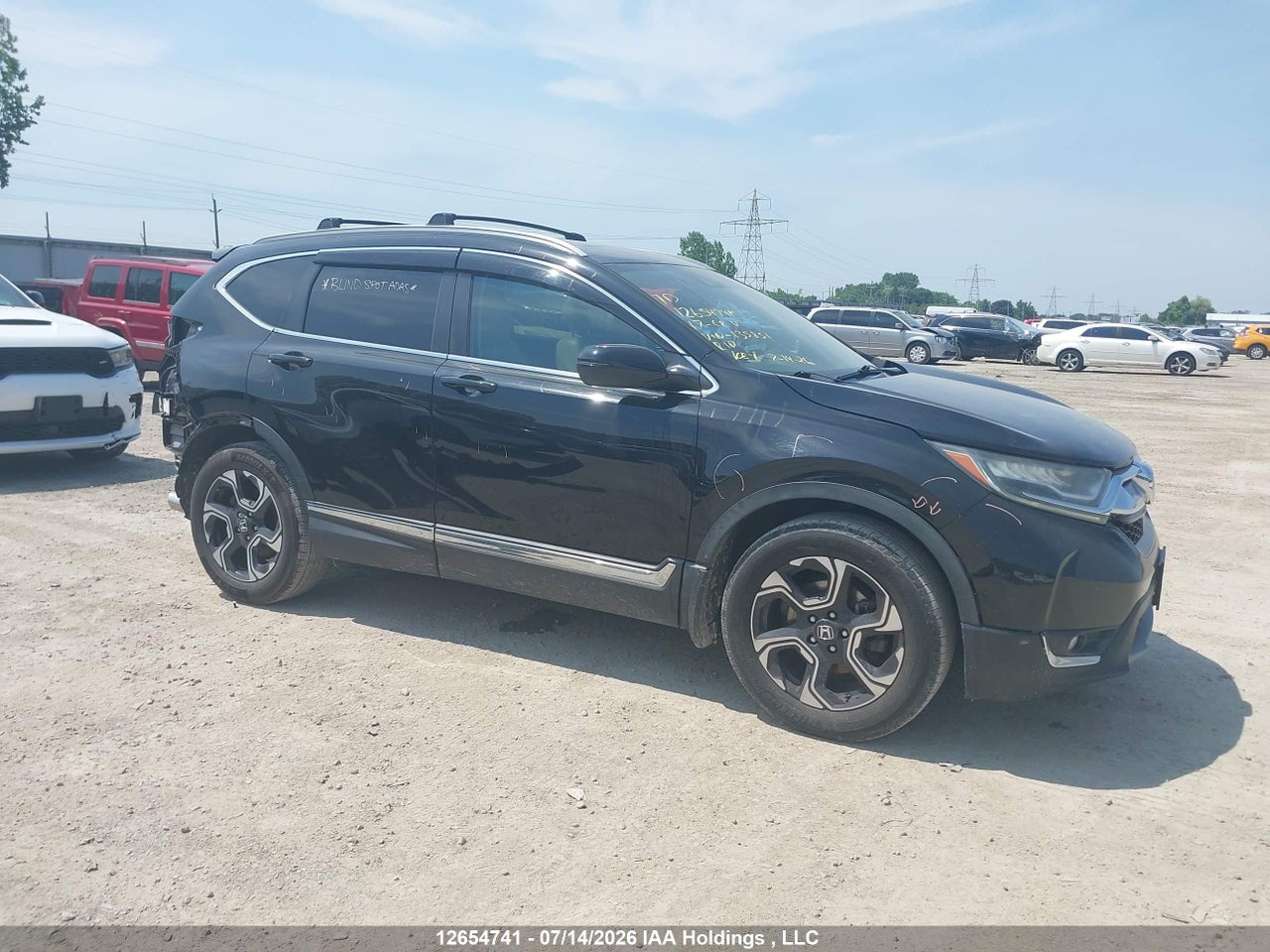 2HKRW2H95HH135851 · 2017 HONDA CR-V TOURING