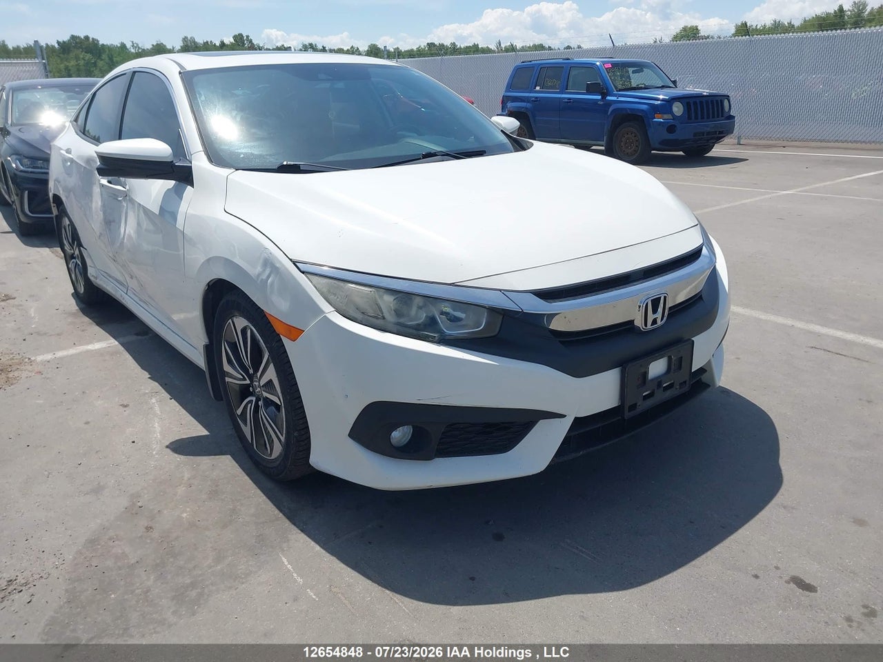 2HGFC1F45GH101186 · 2016 HONDA CIVIC EX-T