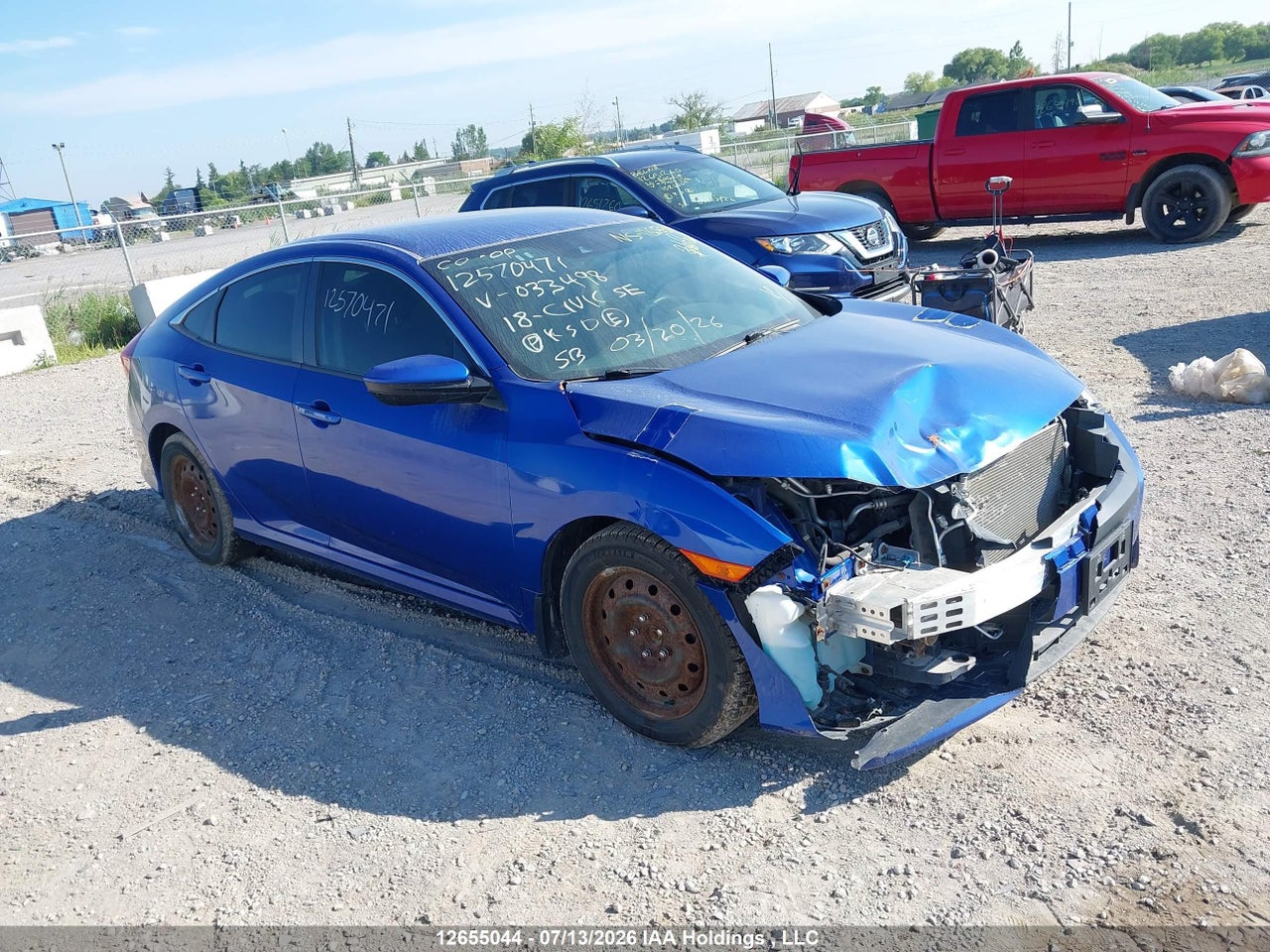 2HGFC2F63JH033498 · 2018 HONDA CIVIC SE