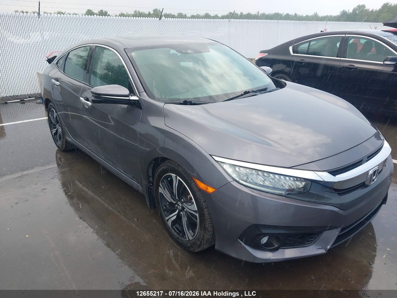 2HGFC1F94JH100131 · 2018 HONDA Civic touring