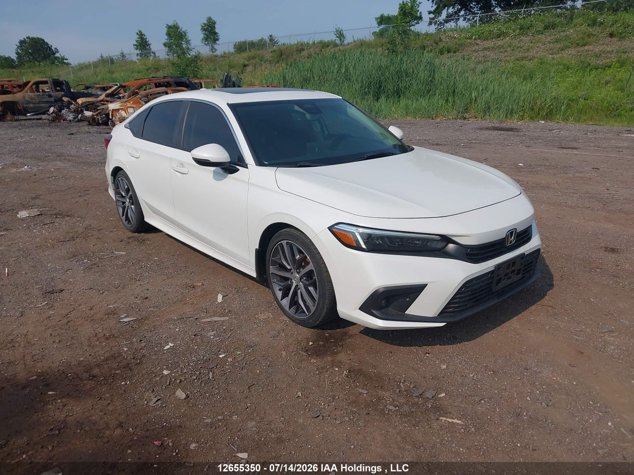 2HGFE1F92NH001808 · 2022 HONDA Civic touring