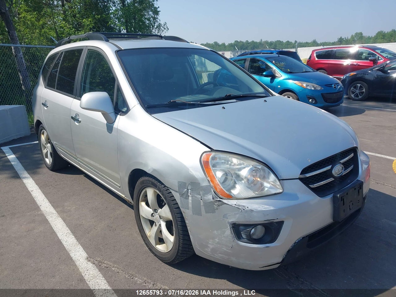 KNAFG526697275748 · 2009 KIA RONDO LX/EX