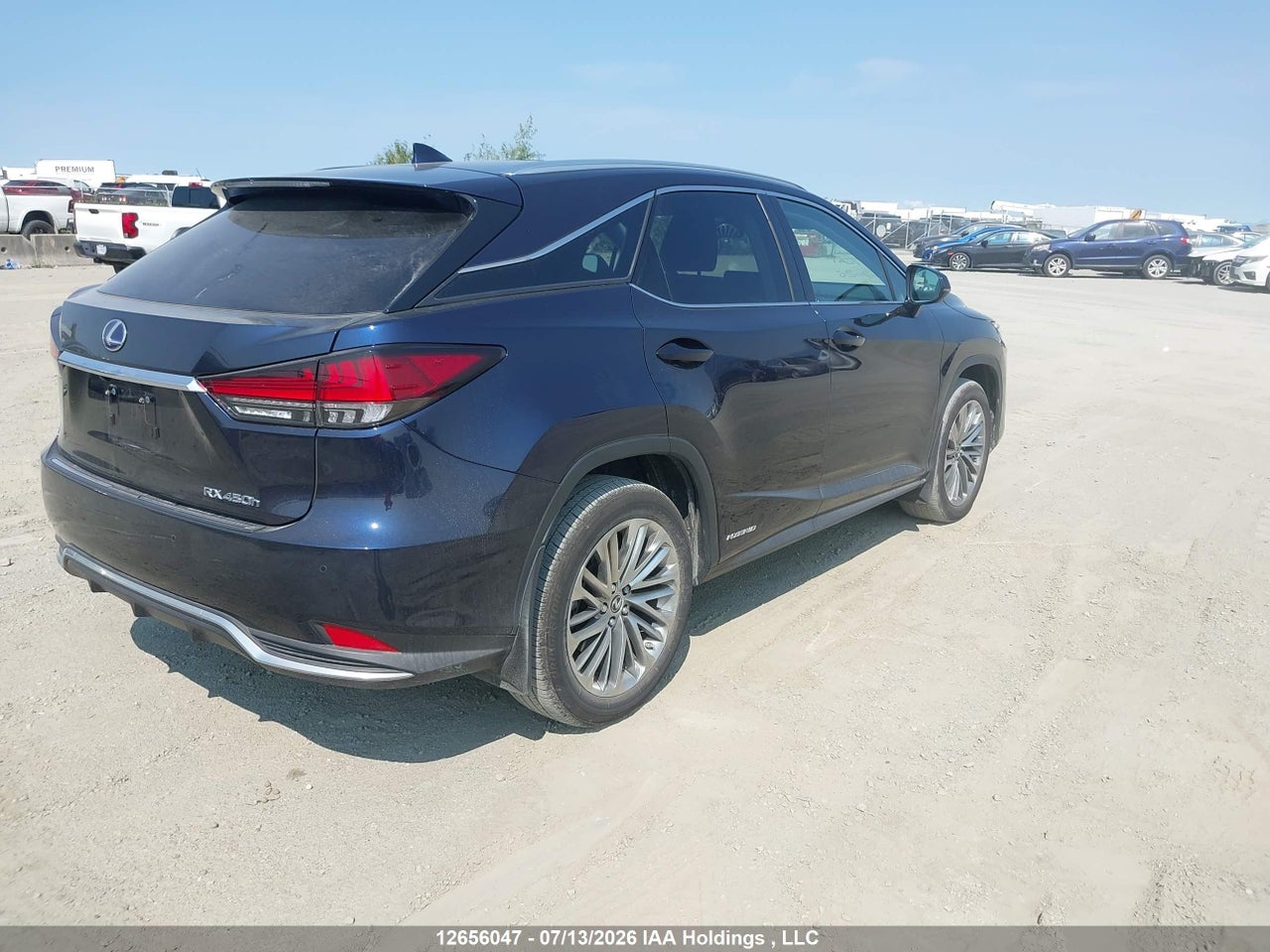 2T2JGMDA7NC077984 · 2022 LEXUS RX 450H · 4/18