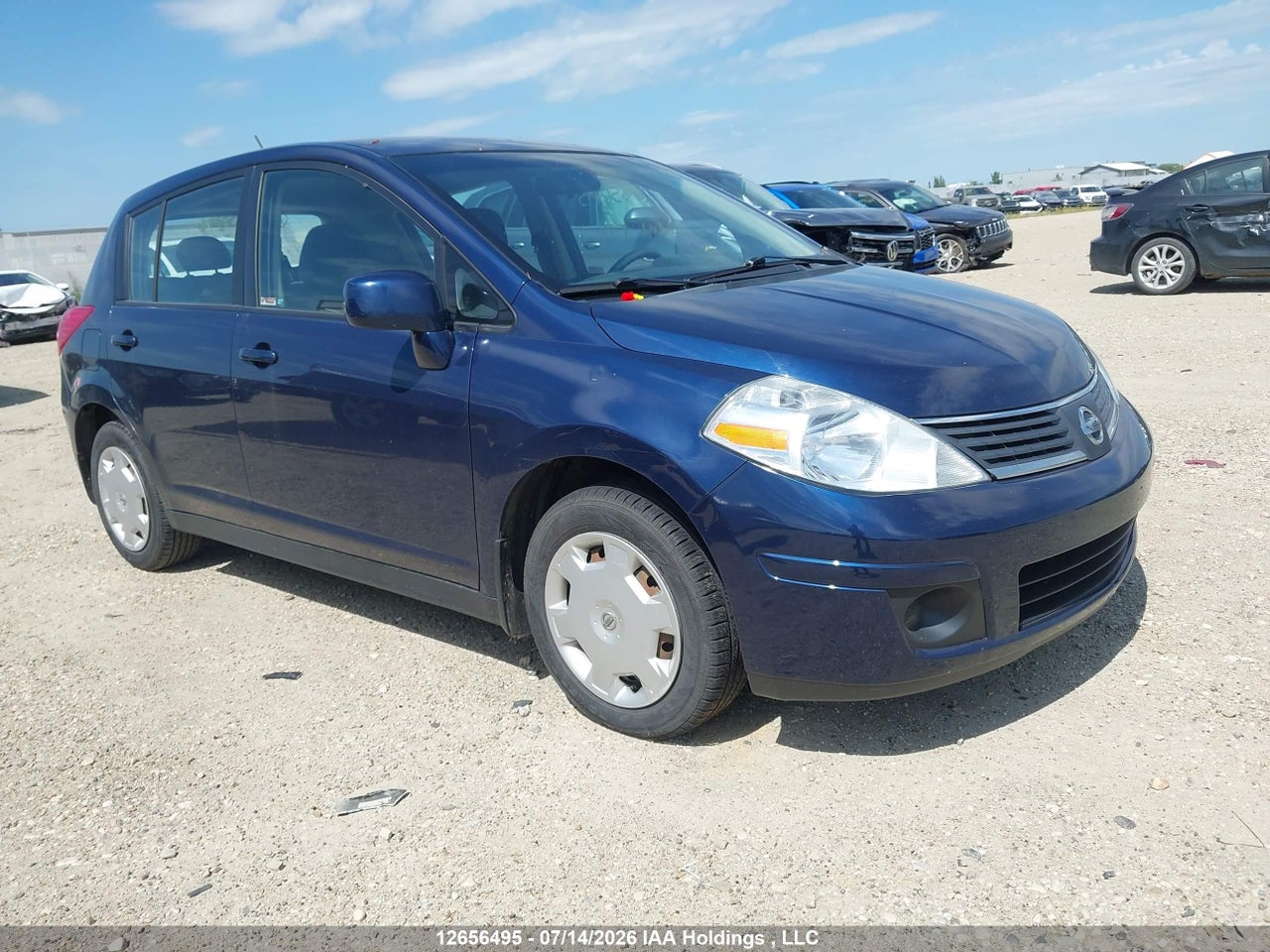 3N1BC13E69L352144 · 2009 NISSAN VERSA S/SL