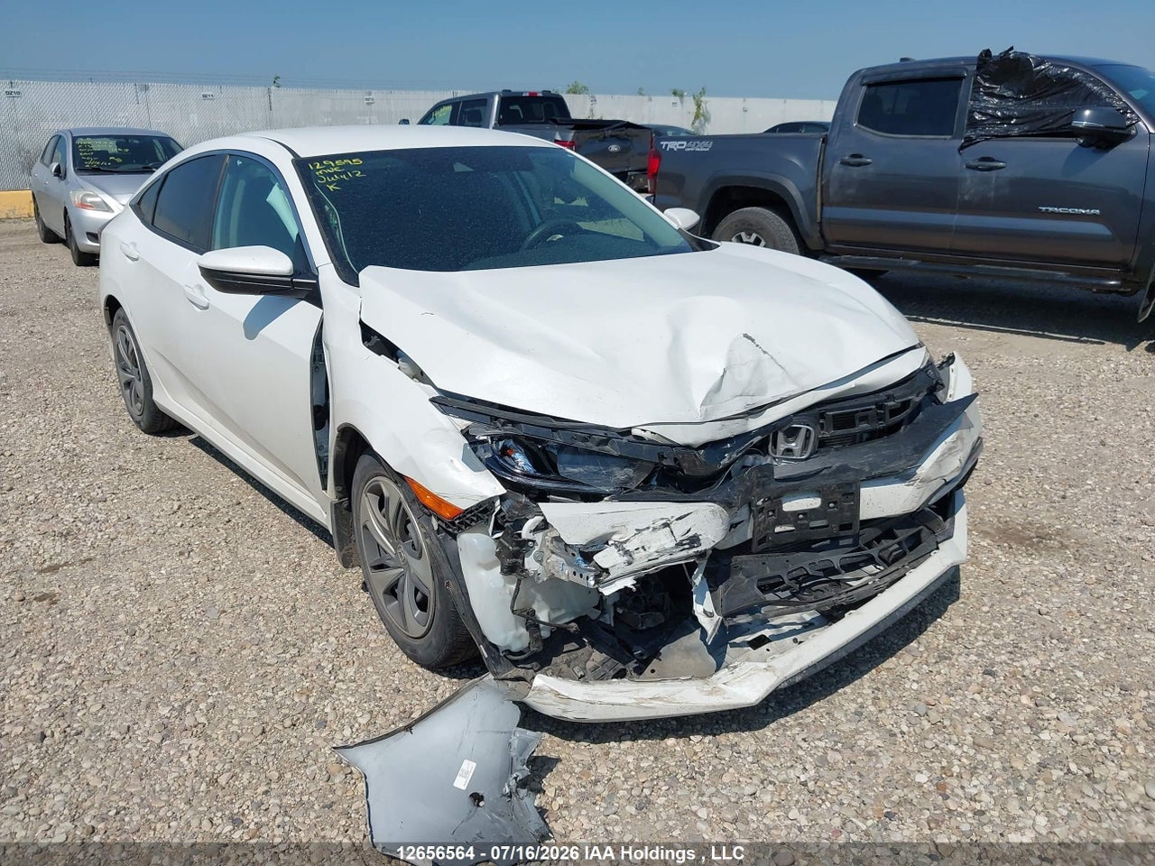 2HGFC2F57LH010283 · 2020 HONDA CIVIC LX