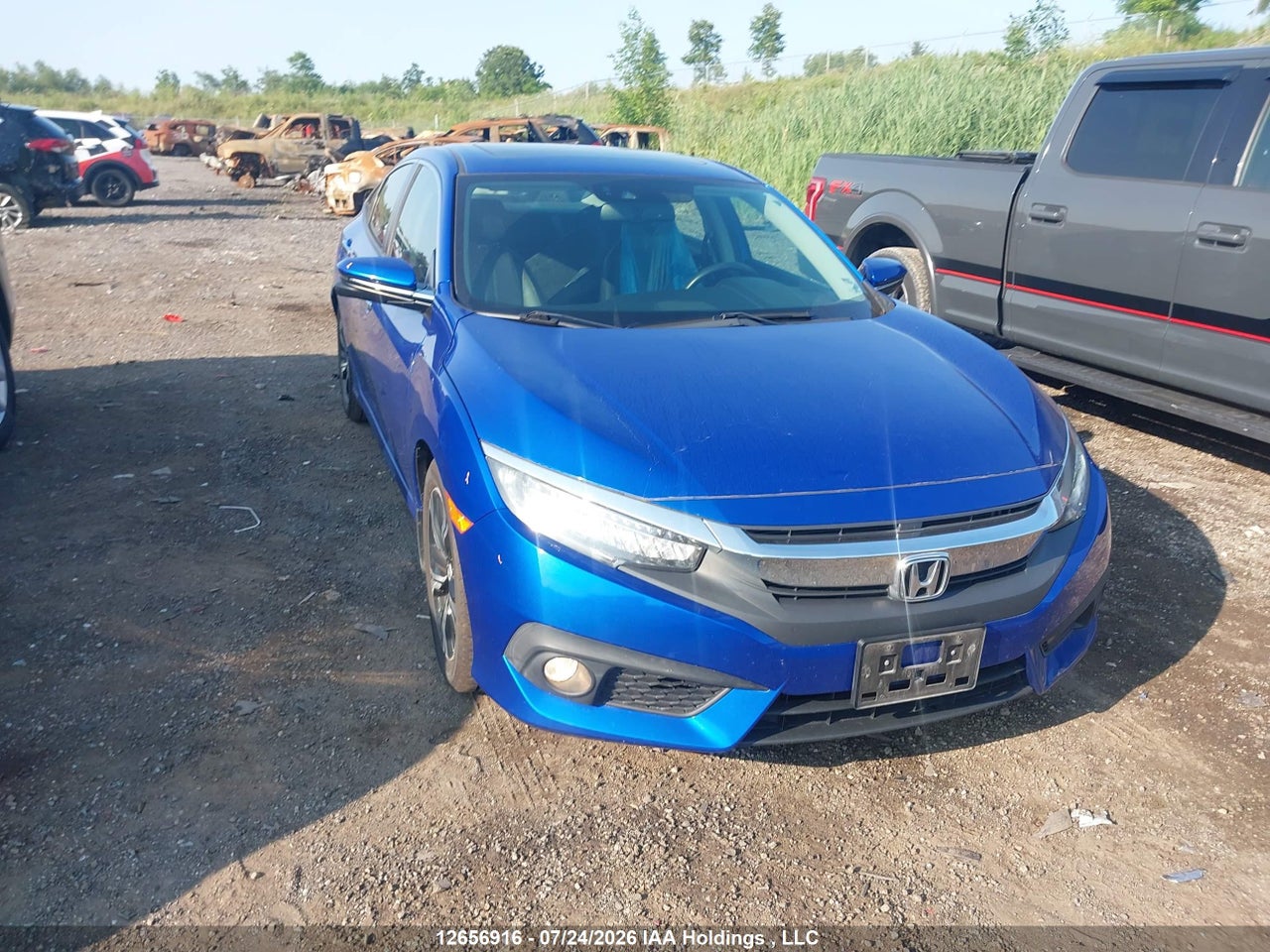 2HGFC1F99HH103973 · 2017 HONDA Civic touring