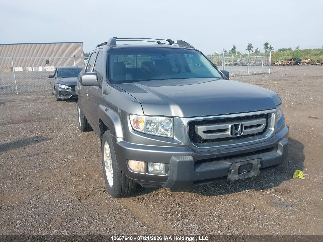 5FPYK1F52AB501133 · 2010 HONDA RIDGELINE RTL