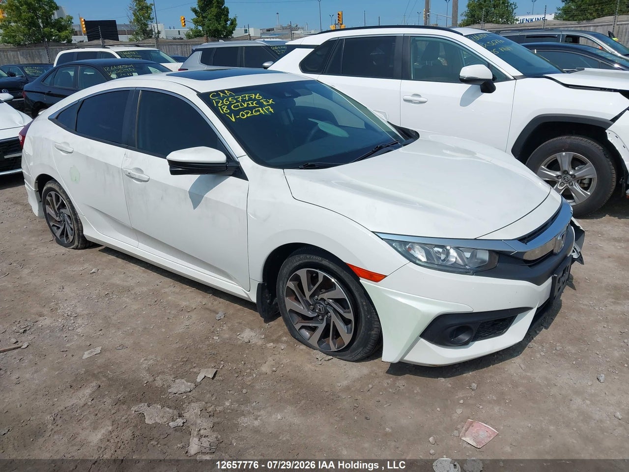 2HGFC2F87JH026717 · 2018 HONDA CIVIC EX