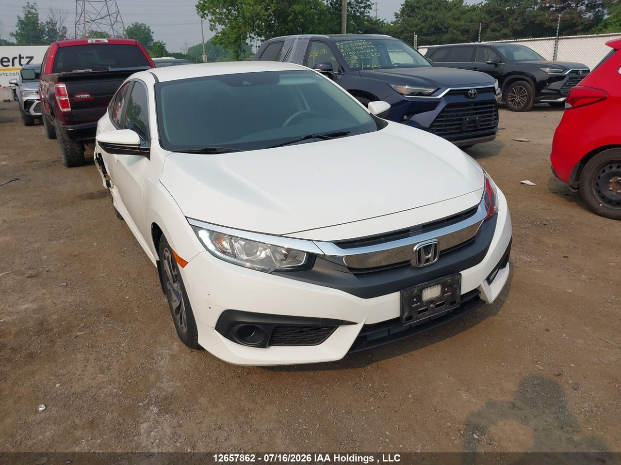 2HGFC2F69JH037278 · 2018 HONDA CIVIC LX