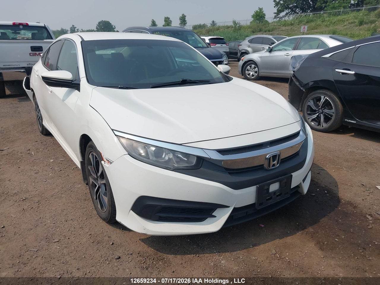 2HGFC2F51JH016268 · 2018 HONDA CIVIC LX
