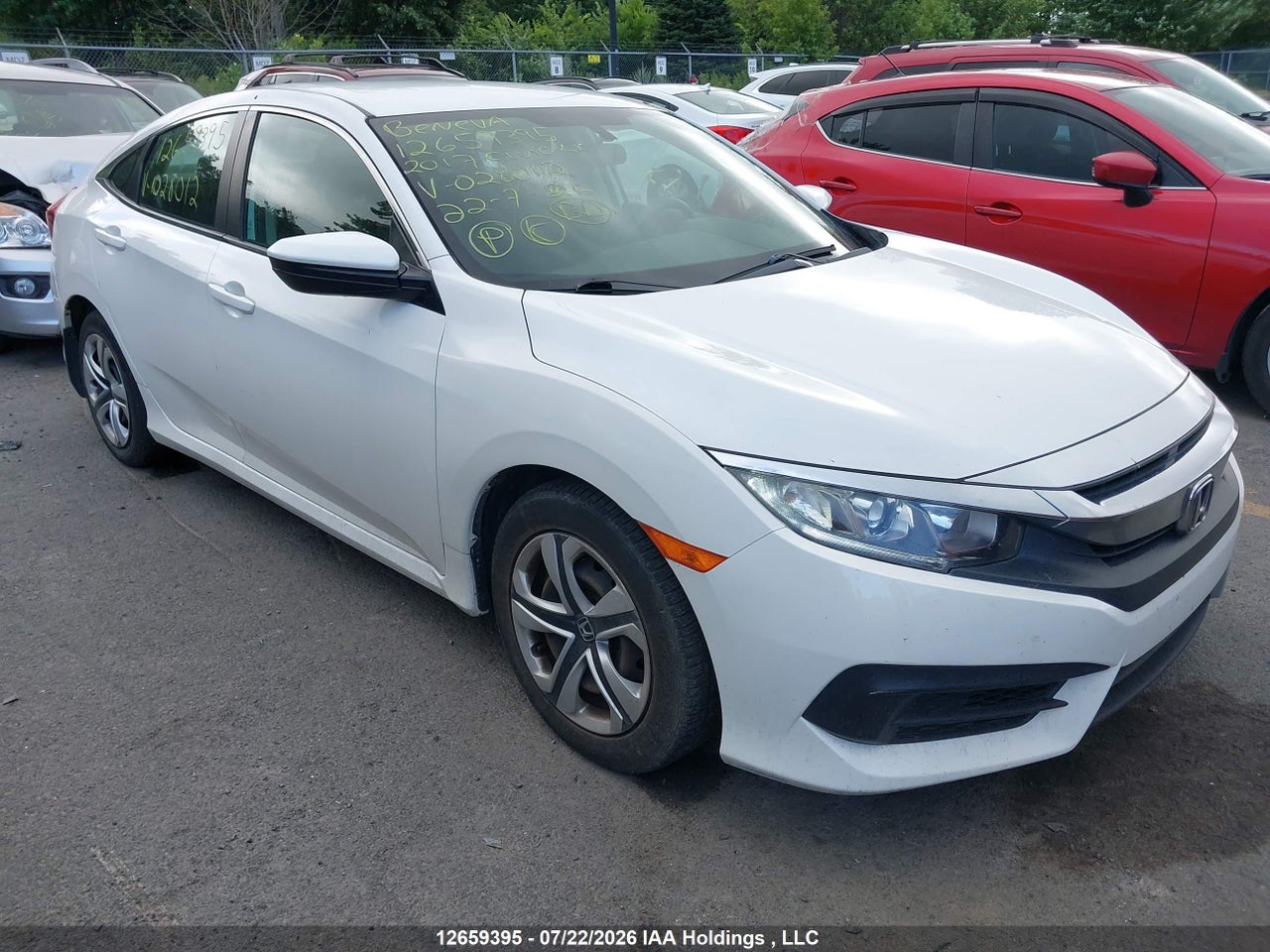 2HGFC2F51HH028012 · 2017 HONDA CIVIC LX