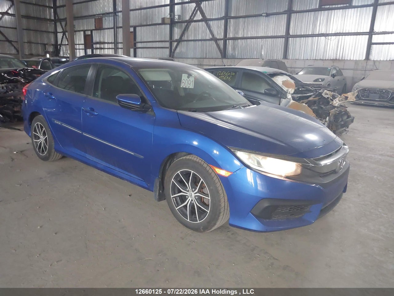 2HGFC2F59HH031644 · 2017 HONDA CIVIC LX