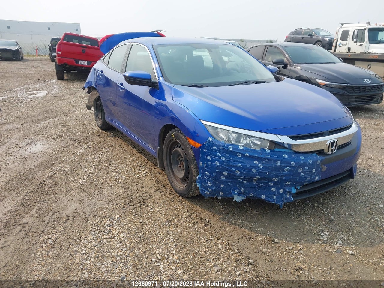 2HGFC2F59JH008628 · 2018 HONDA CIVIC LX