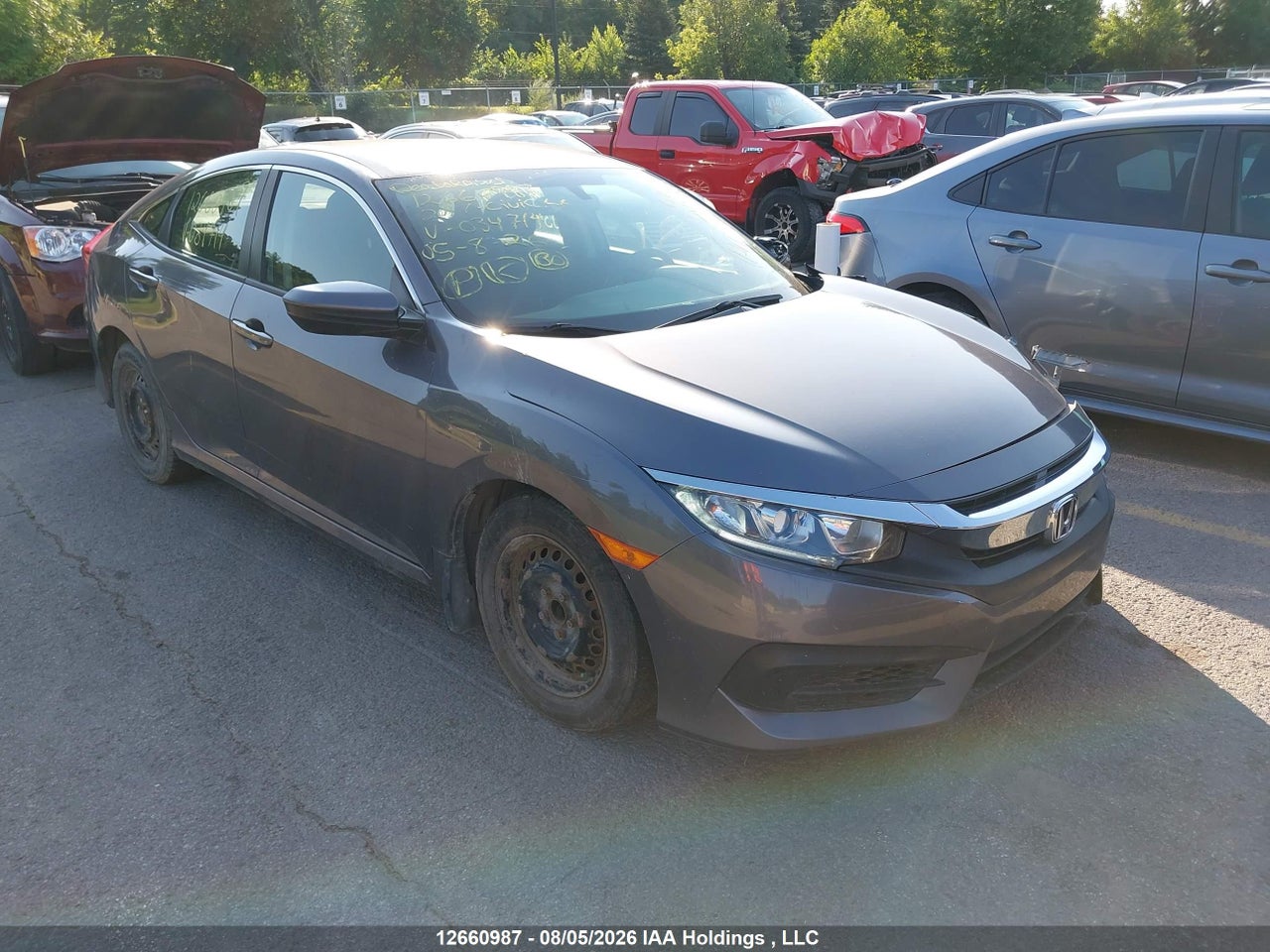 2HGFC2F50JH034714 · 2018 HONDA CIVIC LX