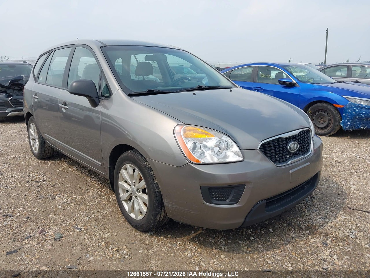 KNAHG8A87C7376463 · 2012 KIA RONDO