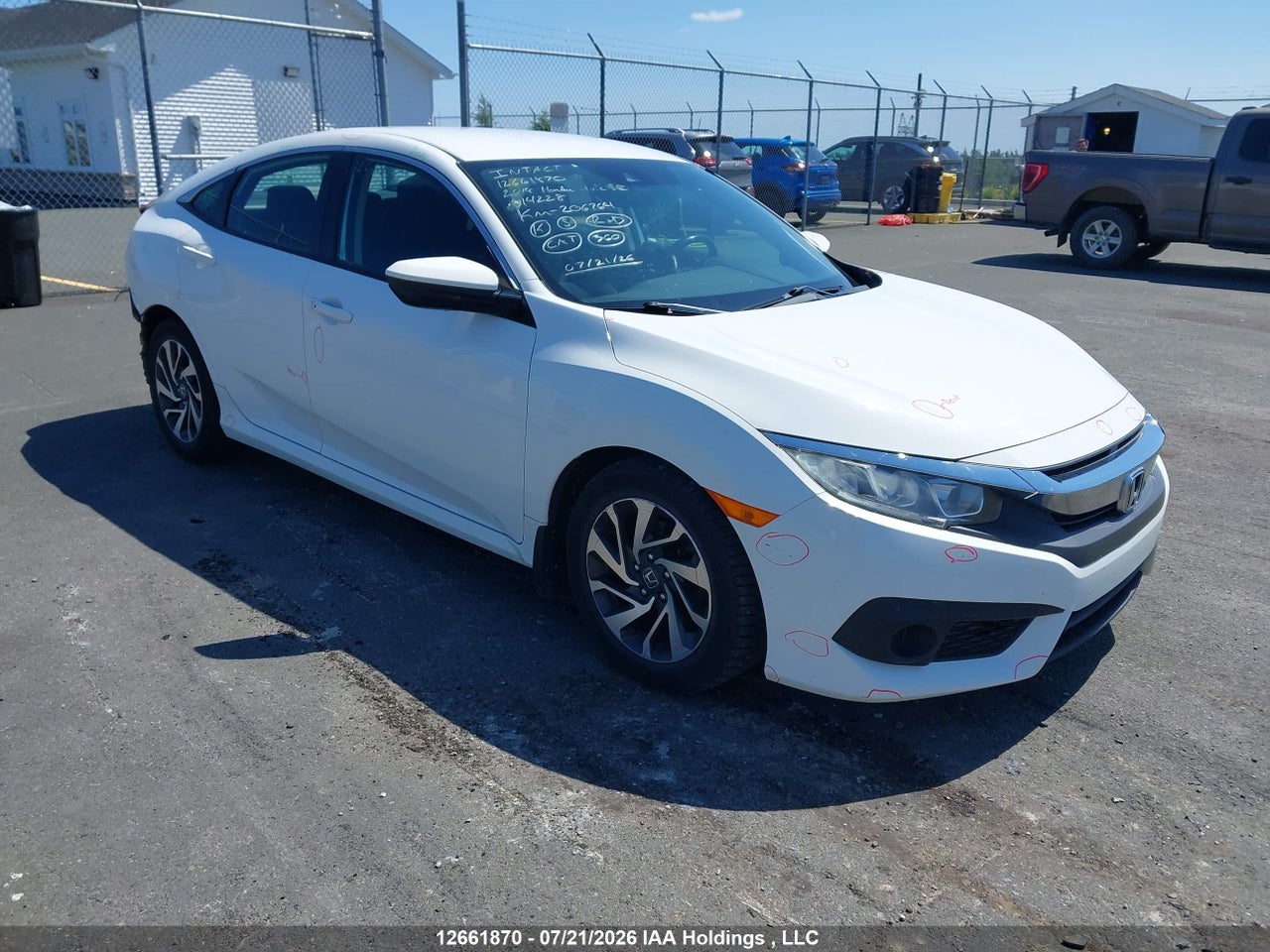 2HGFC2F60JH014228 · 2018 HONDA CIVIC SE