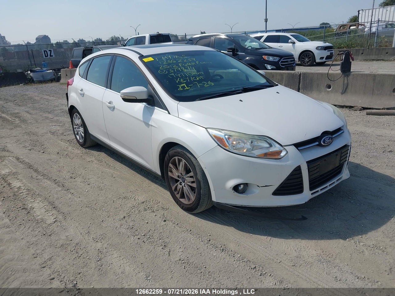 1FAHP3M27CL379874 · 2012 FORD FOCUS SEL